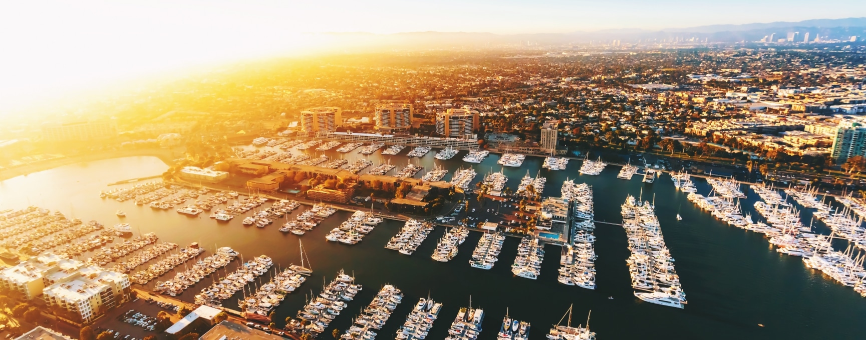 Aerial view of the Marina del Rey harbour and its boat slips at sunset